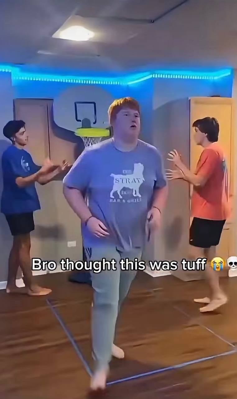 The shooter strutting away while his friends clap in disbelief